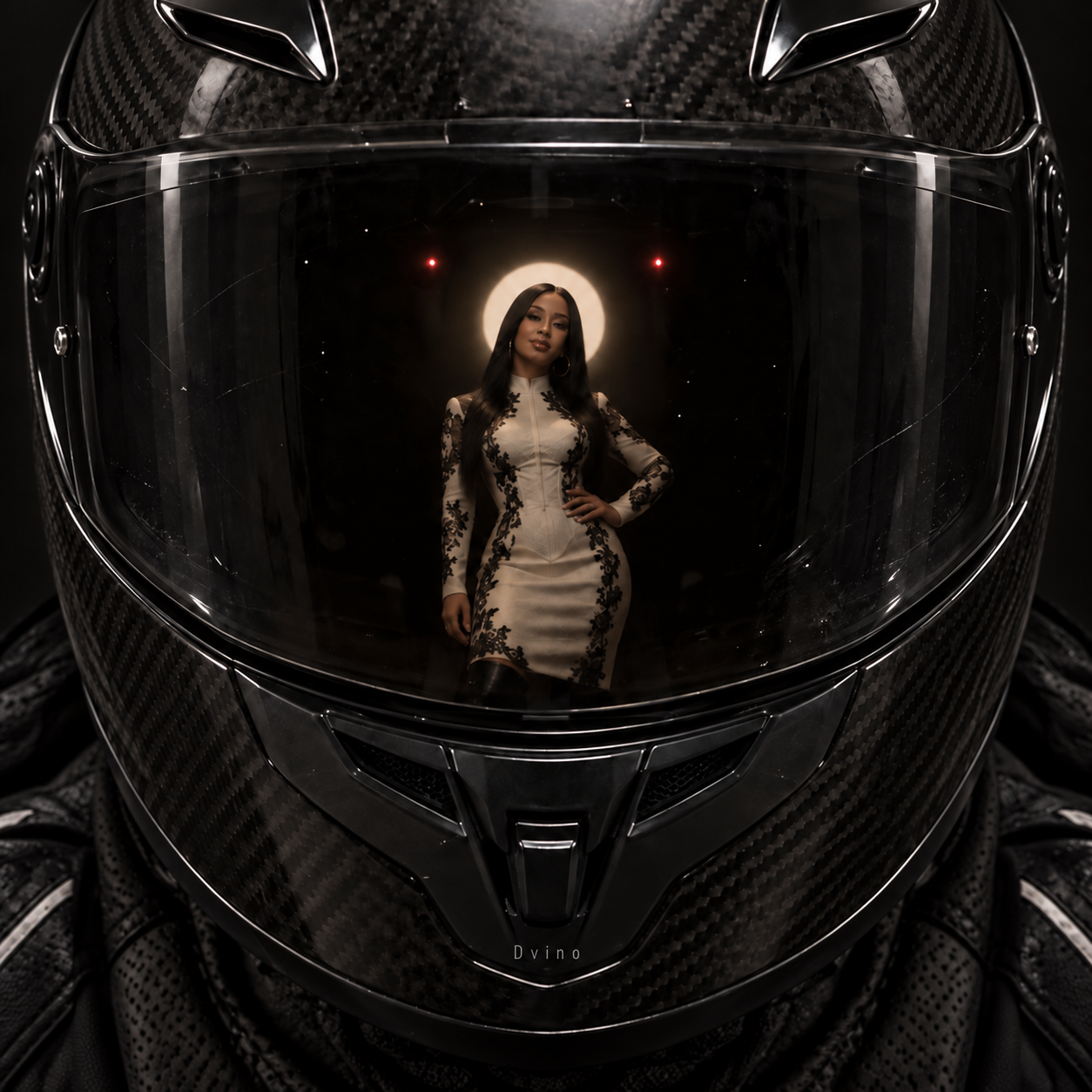 Woman reflected in the visor of a black motorcycle helmet